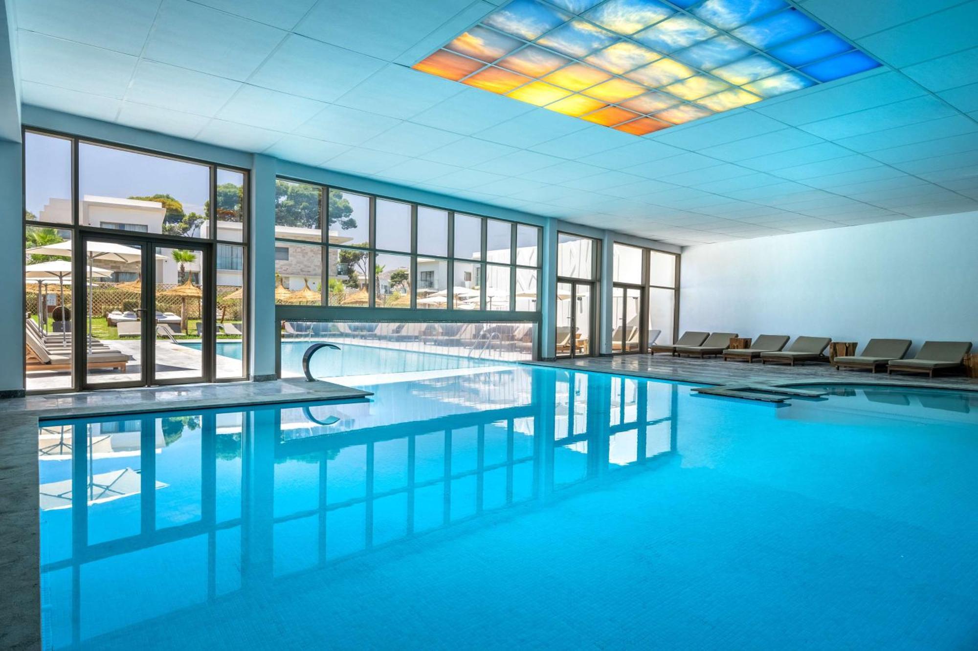 منتجع راديسون بلو الحسيمة المظهر الخارجي الصورة The swimming pool at the hotel